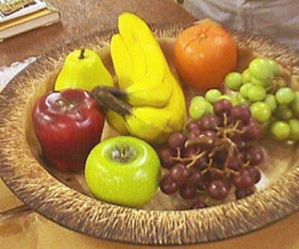 bowl of fruit in a wooden bowl