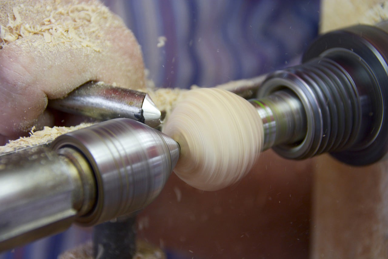 lathe tool rounding out a piece of wood