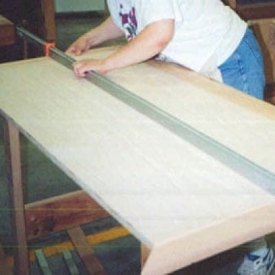 clamped side boards on a larger sheet of wood