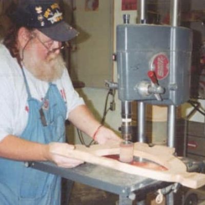 sanding the inside of a wood topper