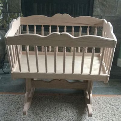 unstained light wood bassinet