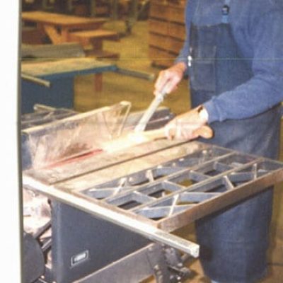 pushing through wood on a table saw